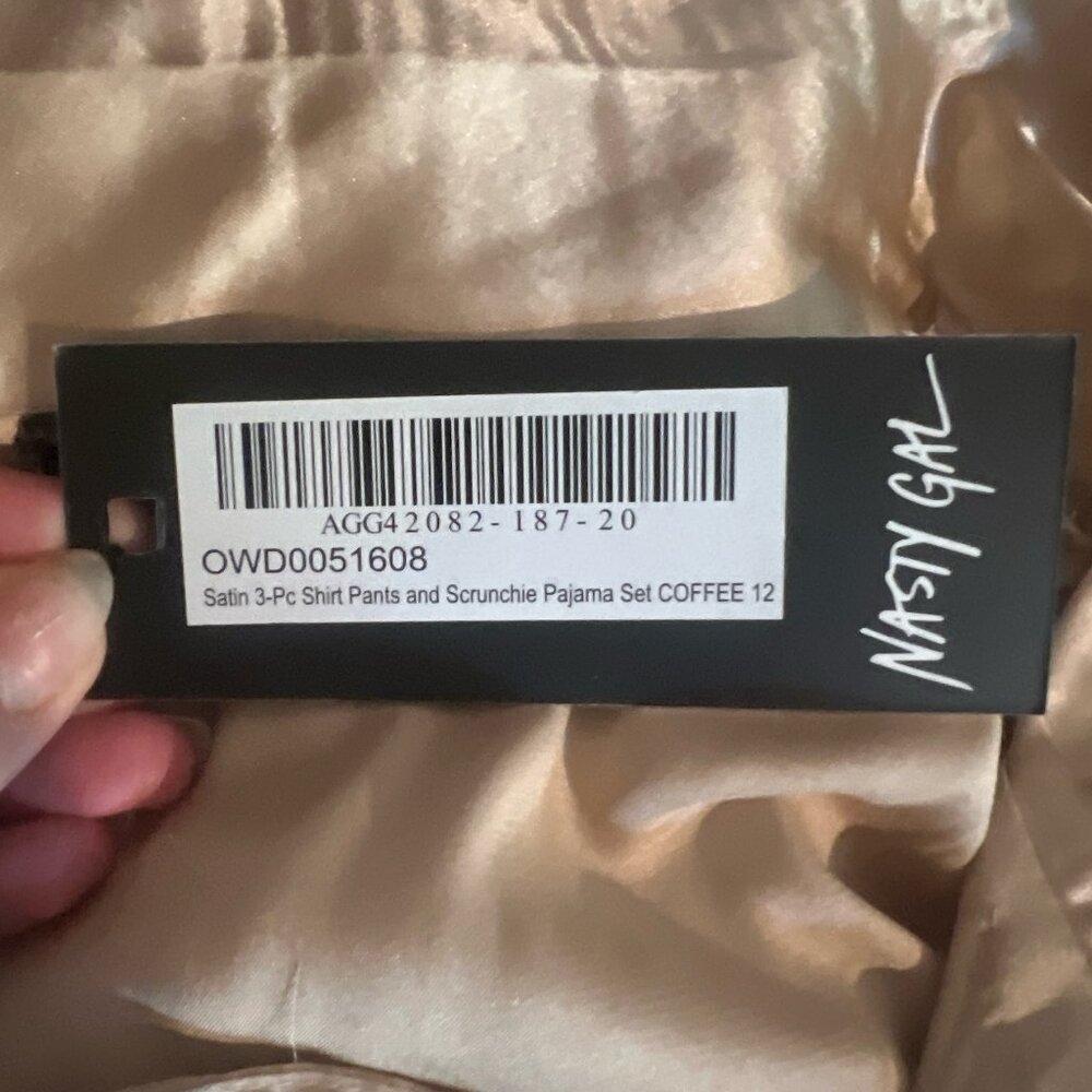 Set—New in packaging PAJAMAS (3 pc. set-pants, shirt, scrunchie) from Nasty Gal!